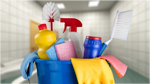 Commercial cleaners working in a Stjohnswood office reception area